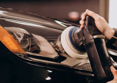 head light being polished